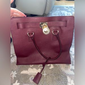 Burgundy Michael Kors purse with Kale Spade wallet